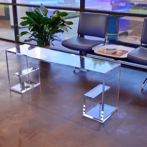 Mesa de sala de espera de metacrilato con revistas